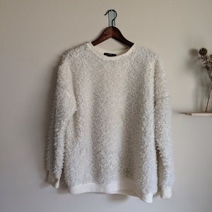 Fluffy white sweater